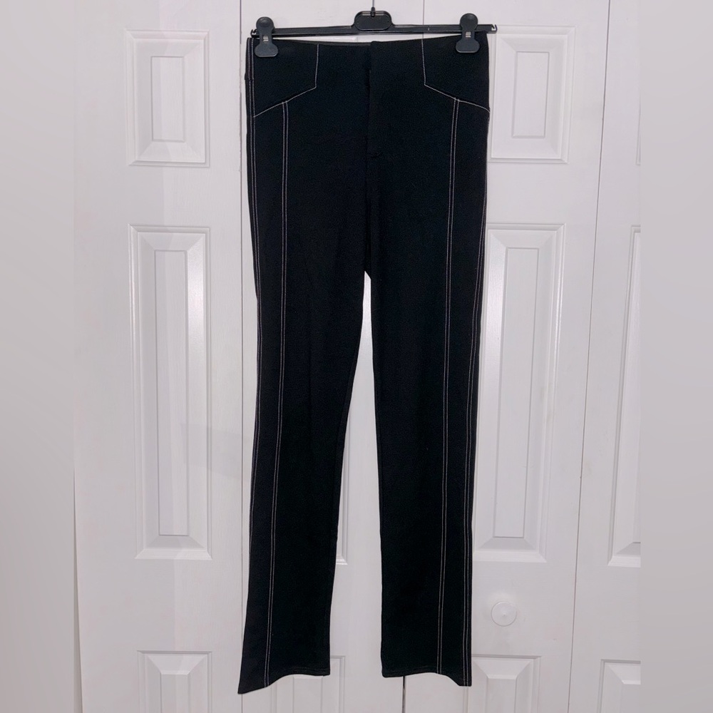 International Concepts black riding pant with white stripes. Size 8
